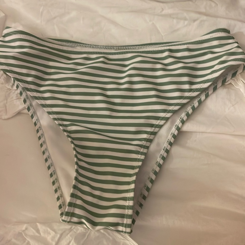 Green and white stripped bikini swimsuit. I don’t know where it’s from.